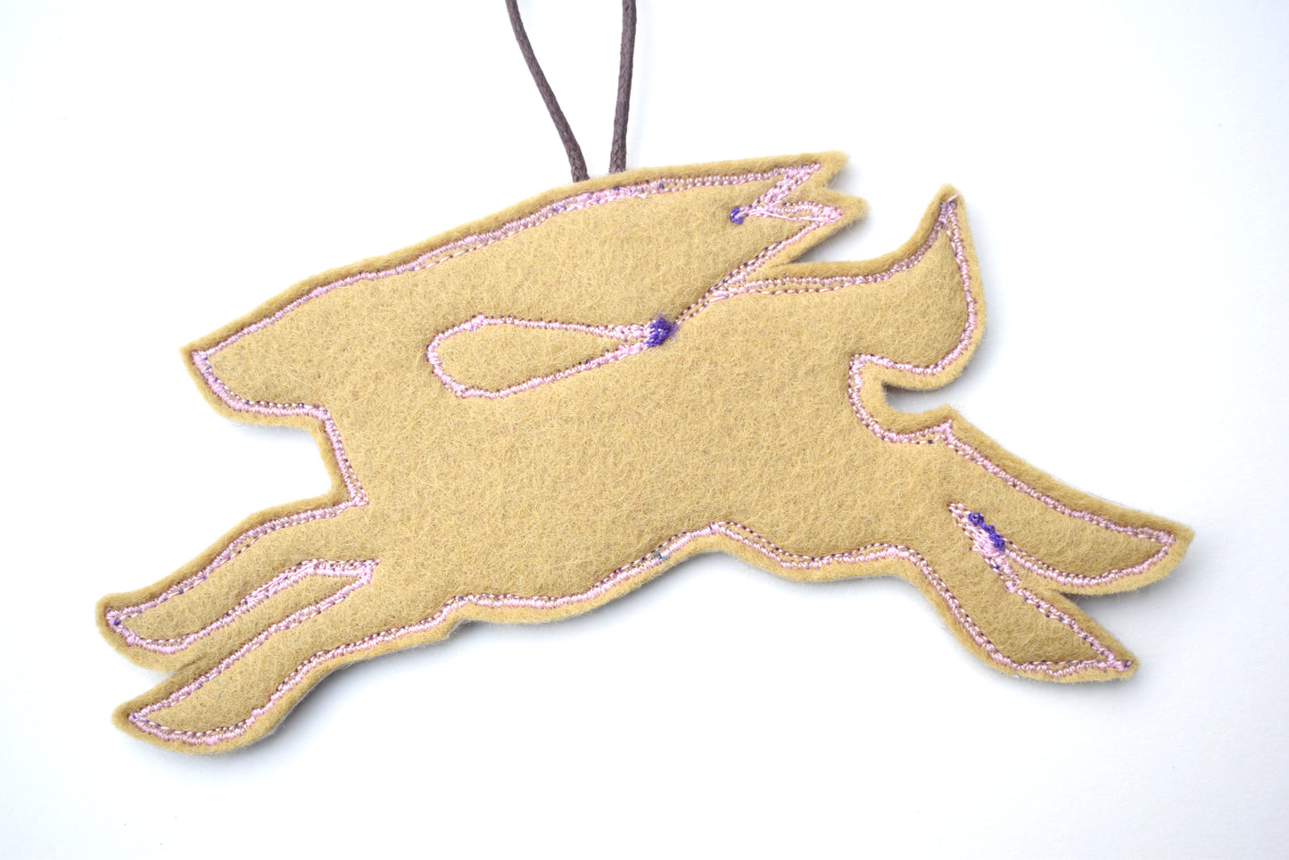 Embroidered leafy hare wall hanging