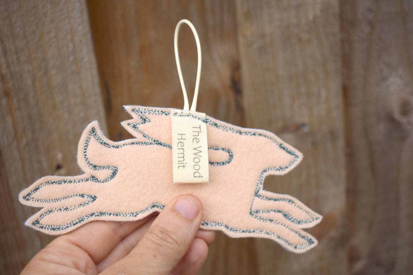 Embroidered leafy hare wall hanging