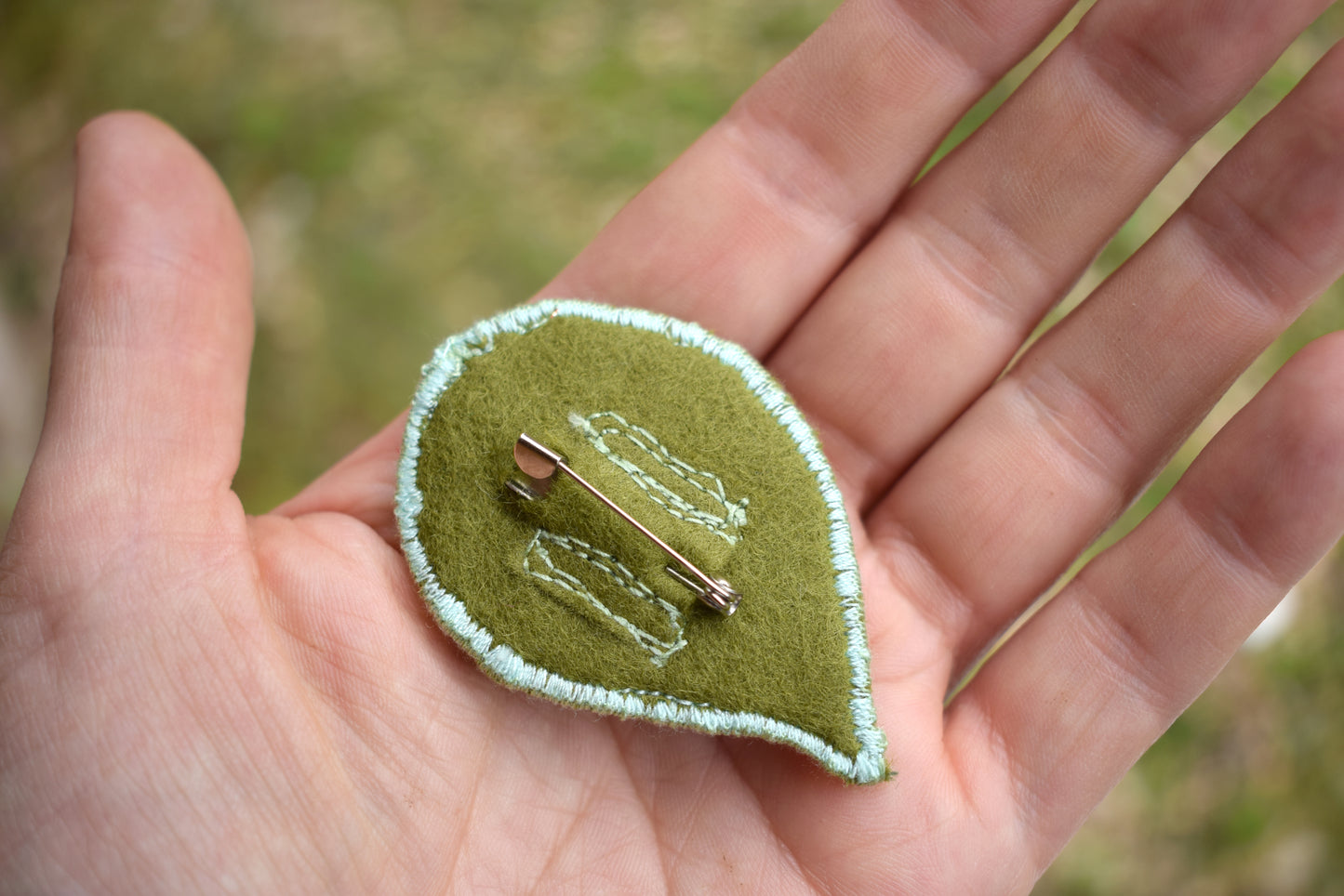 Green and Copper coloured leaf brooch