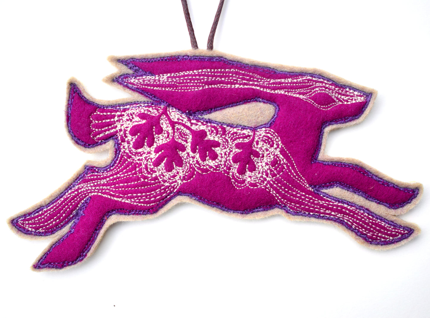Embroidered leafy hare wall hanging