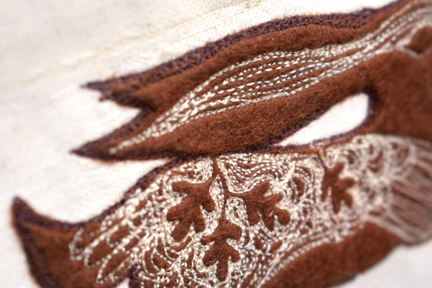 Embroidered leafy hare wall hanging