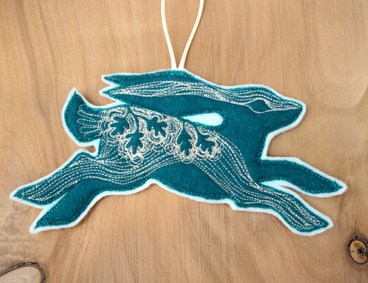 Embroidered leafy hare wall hanging