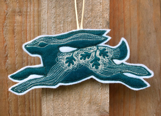 Embroidered leafy hare wall hanging
