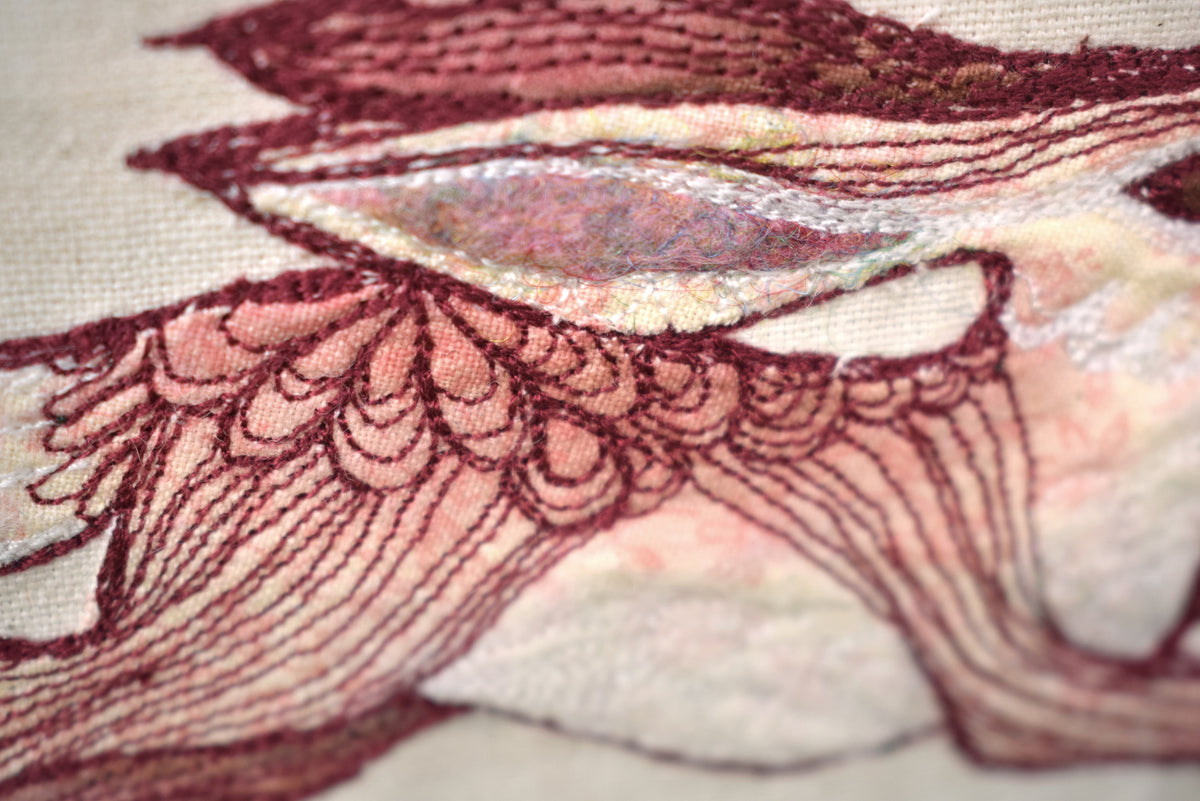 Embroidered hare wall hanging