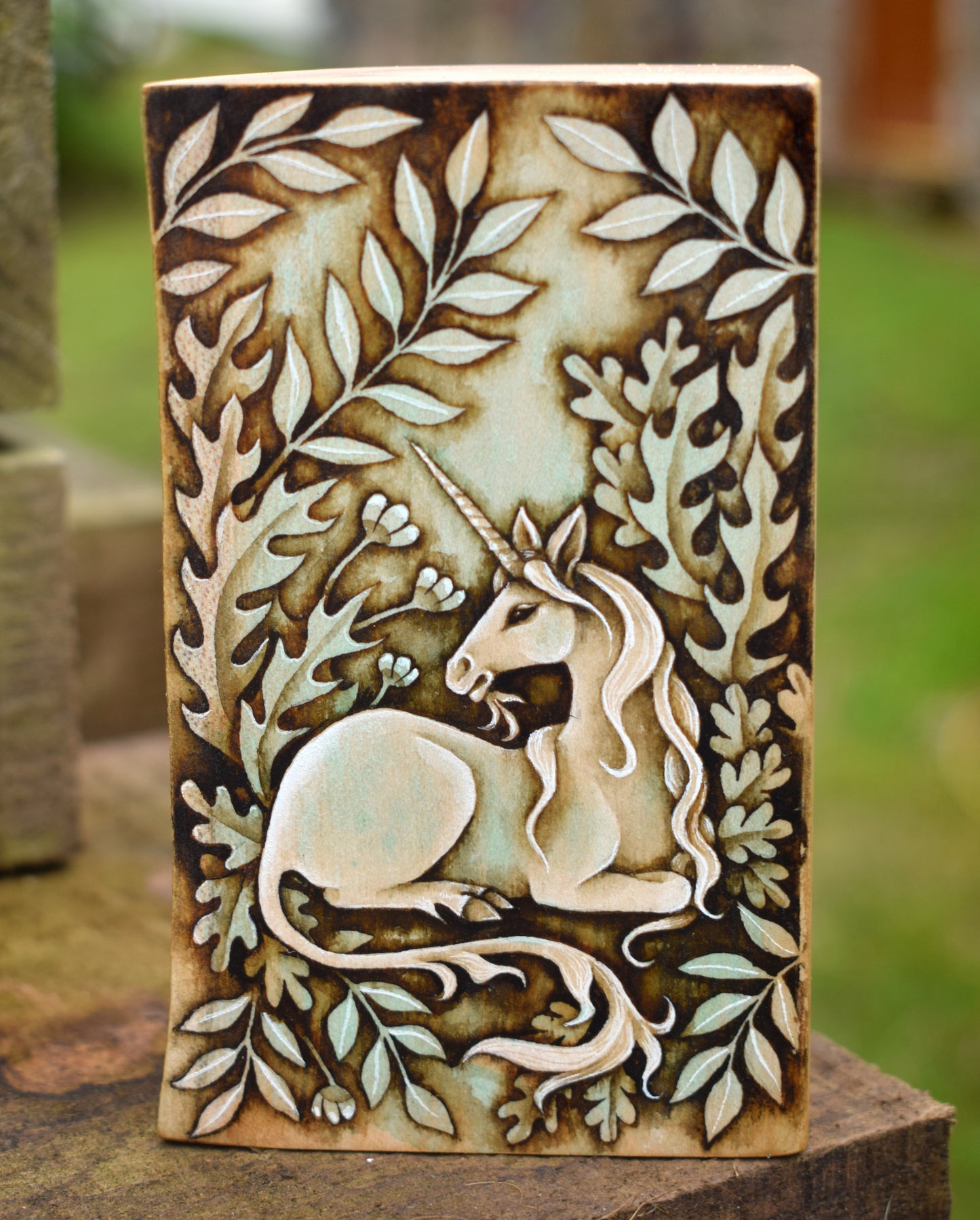 Unicorn watercolour on wood