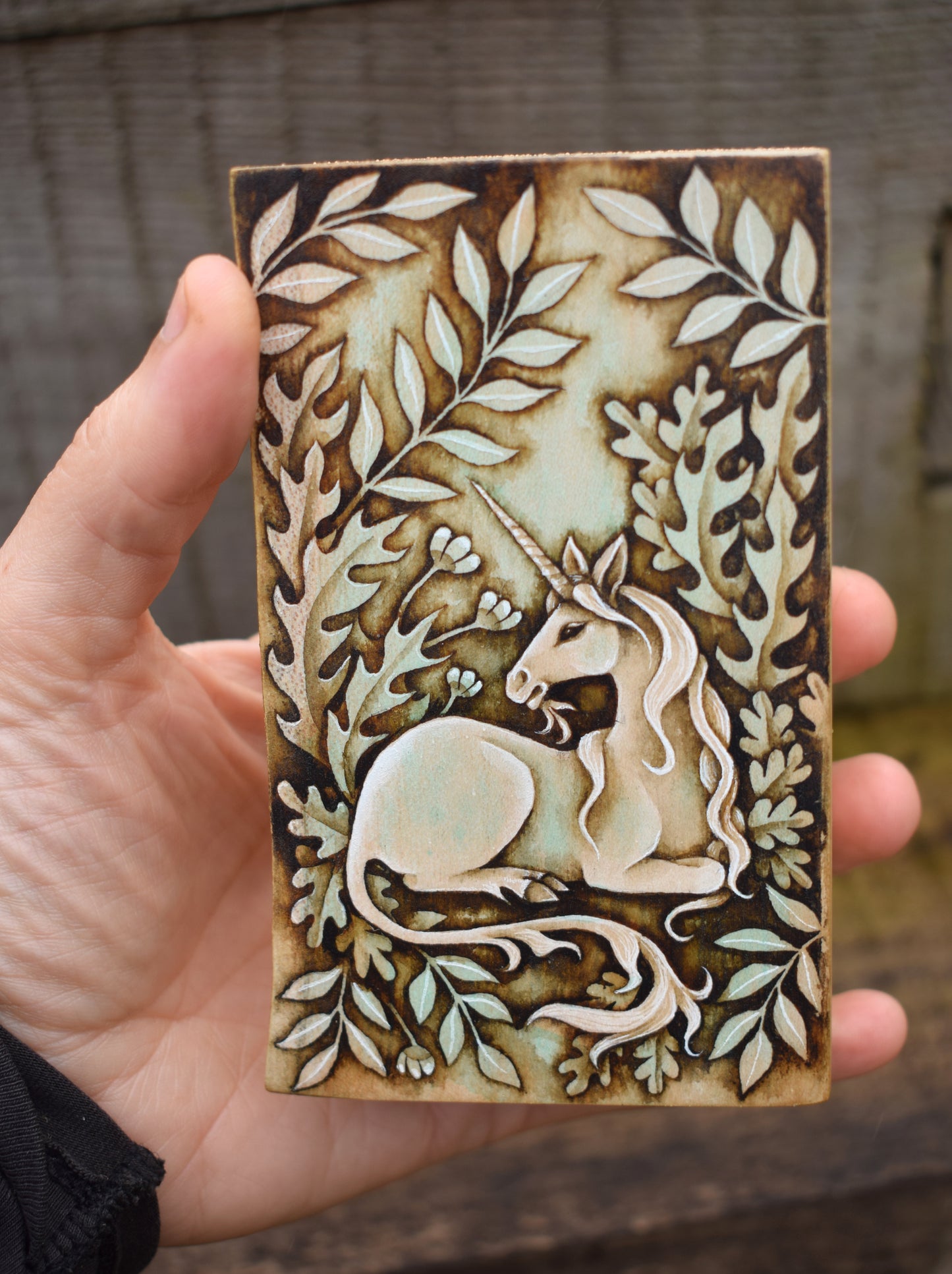 Unicorn watercolour on wood