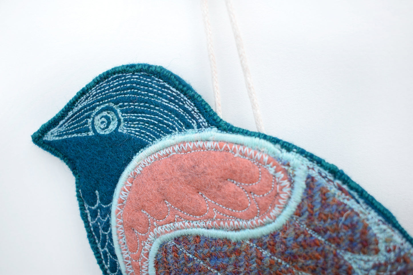 Perching bird - Embroidered felt and tweed wall hanging