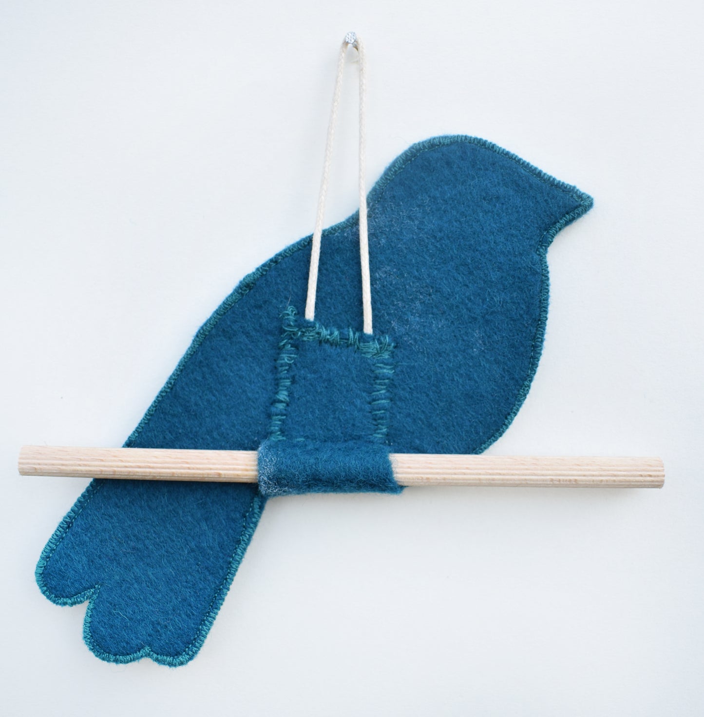 Perching bird - Embroidered felt and tweed wall hanging