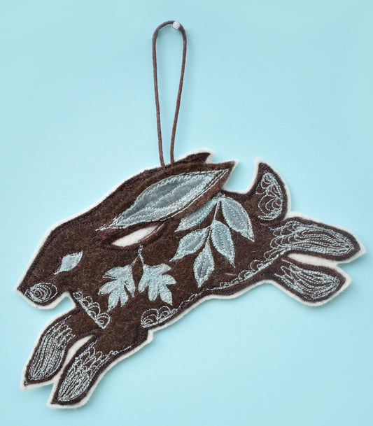 Embroidered felt and silk hare wall hanging