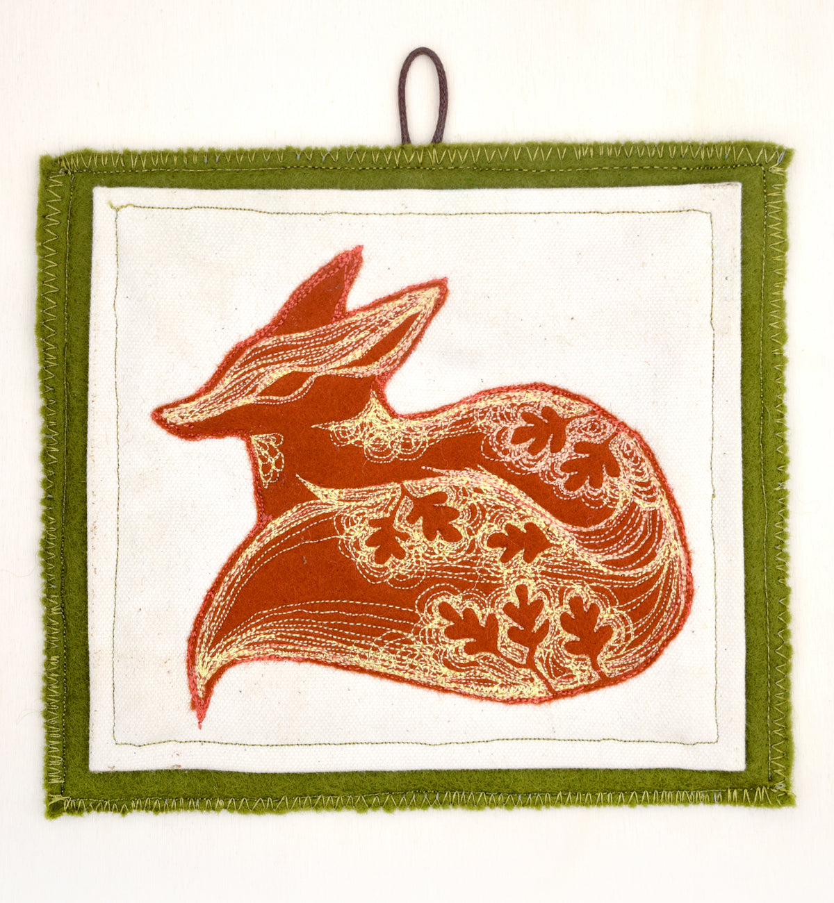 Embroidered leafy fox wall hanging