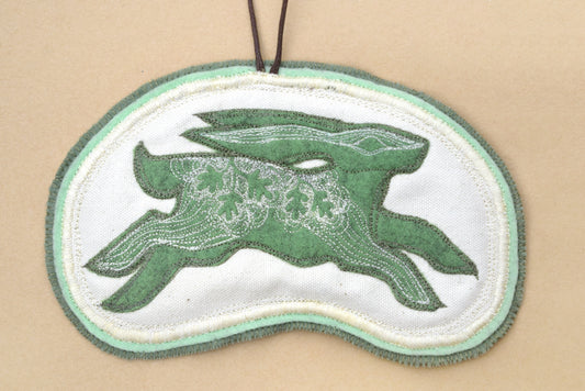 Embroidered leafy hare wall hanging