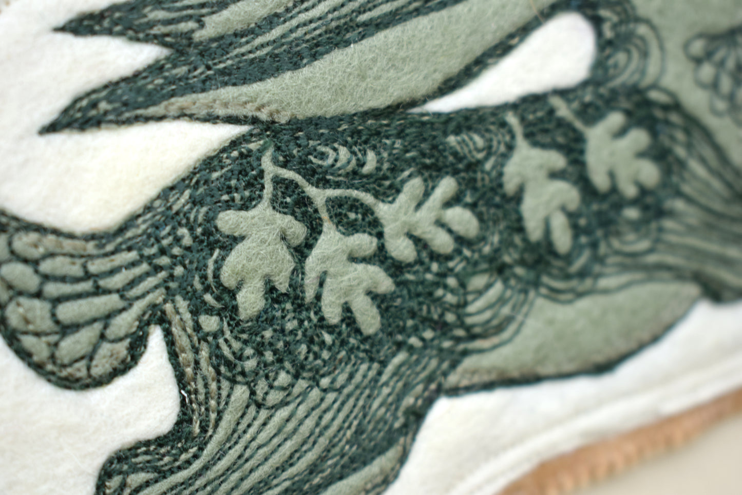 Embroidered leafy hare wall hanging