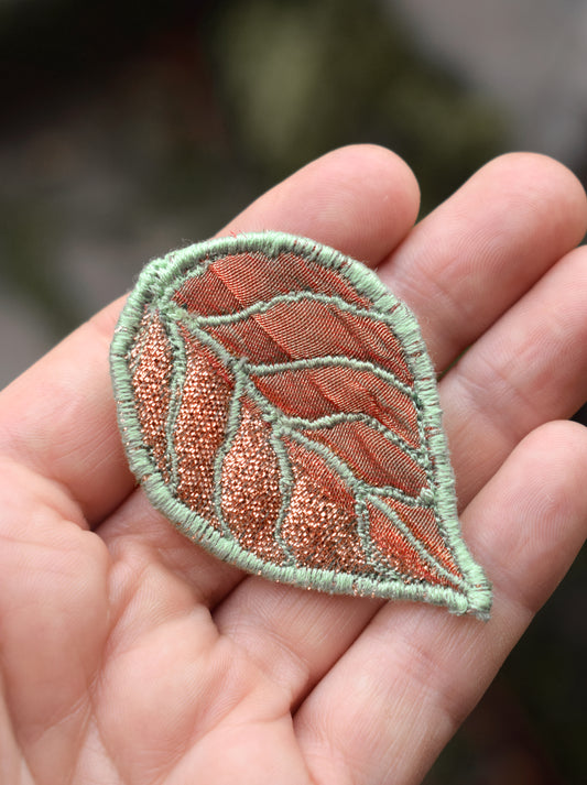 Green and Copper coloured leaf brooch