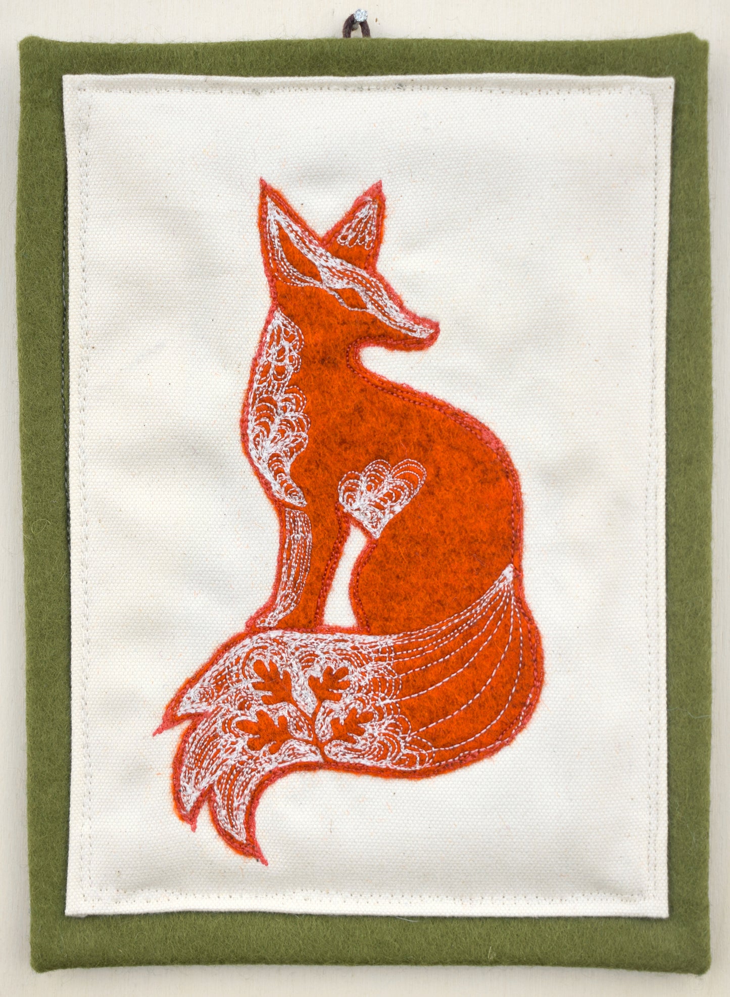 Embroidered leafy fox wall hanging