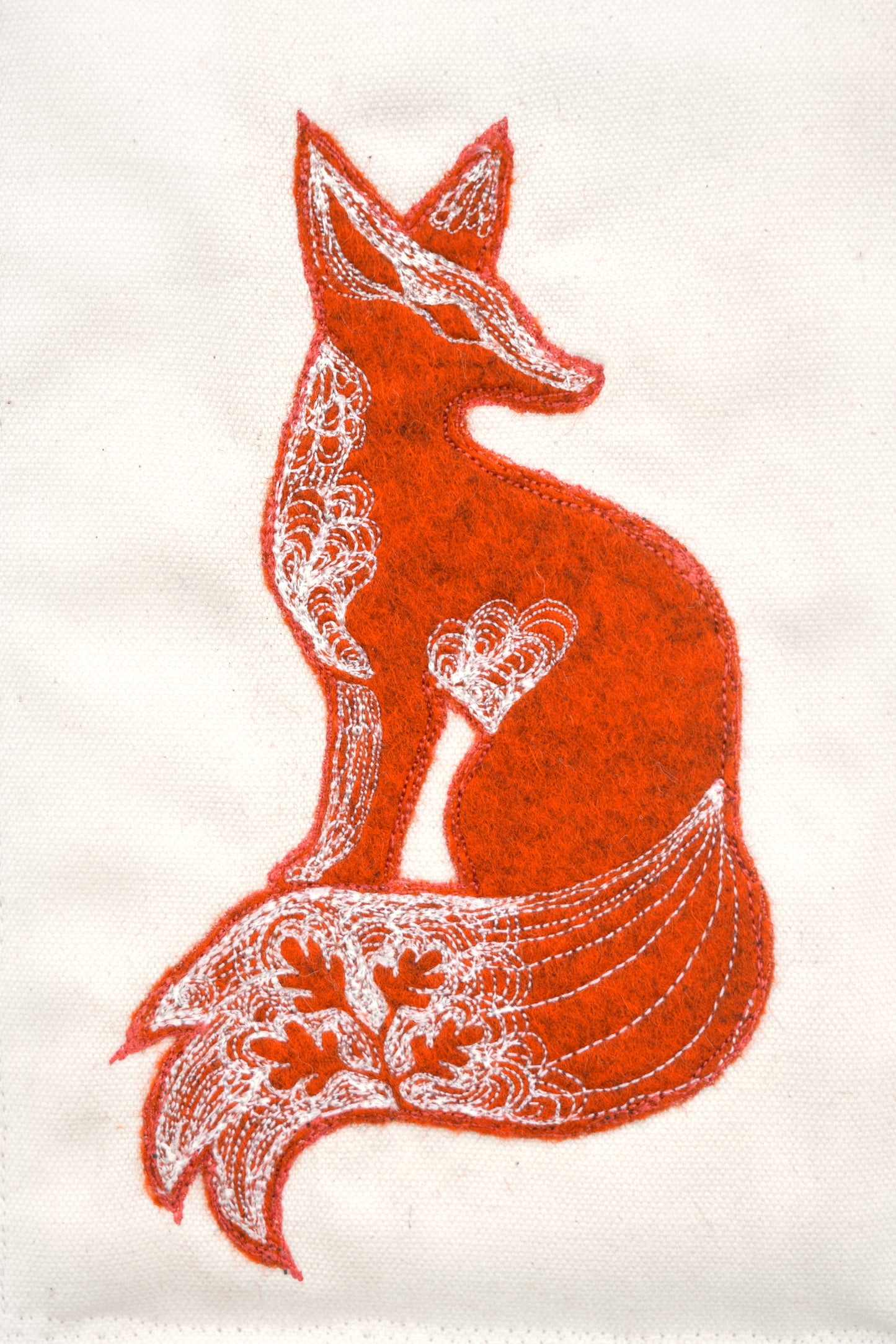 Embroidered leafy fox wall hanging