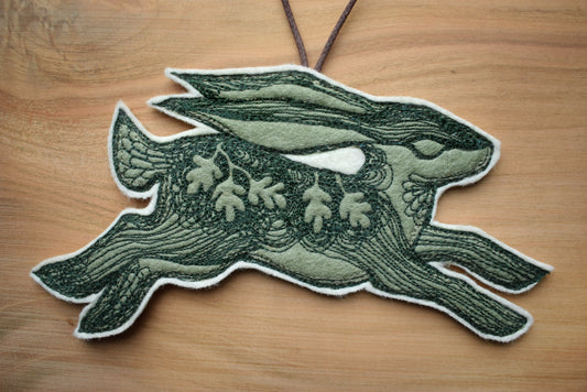Embroidered leafy hare wall hanging