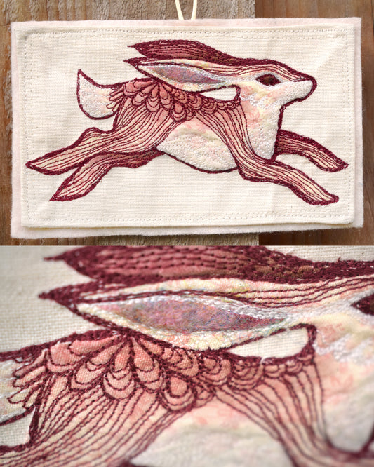 Embroidered hare wall hanging